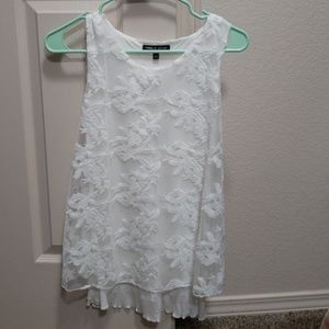 White sleeveless top